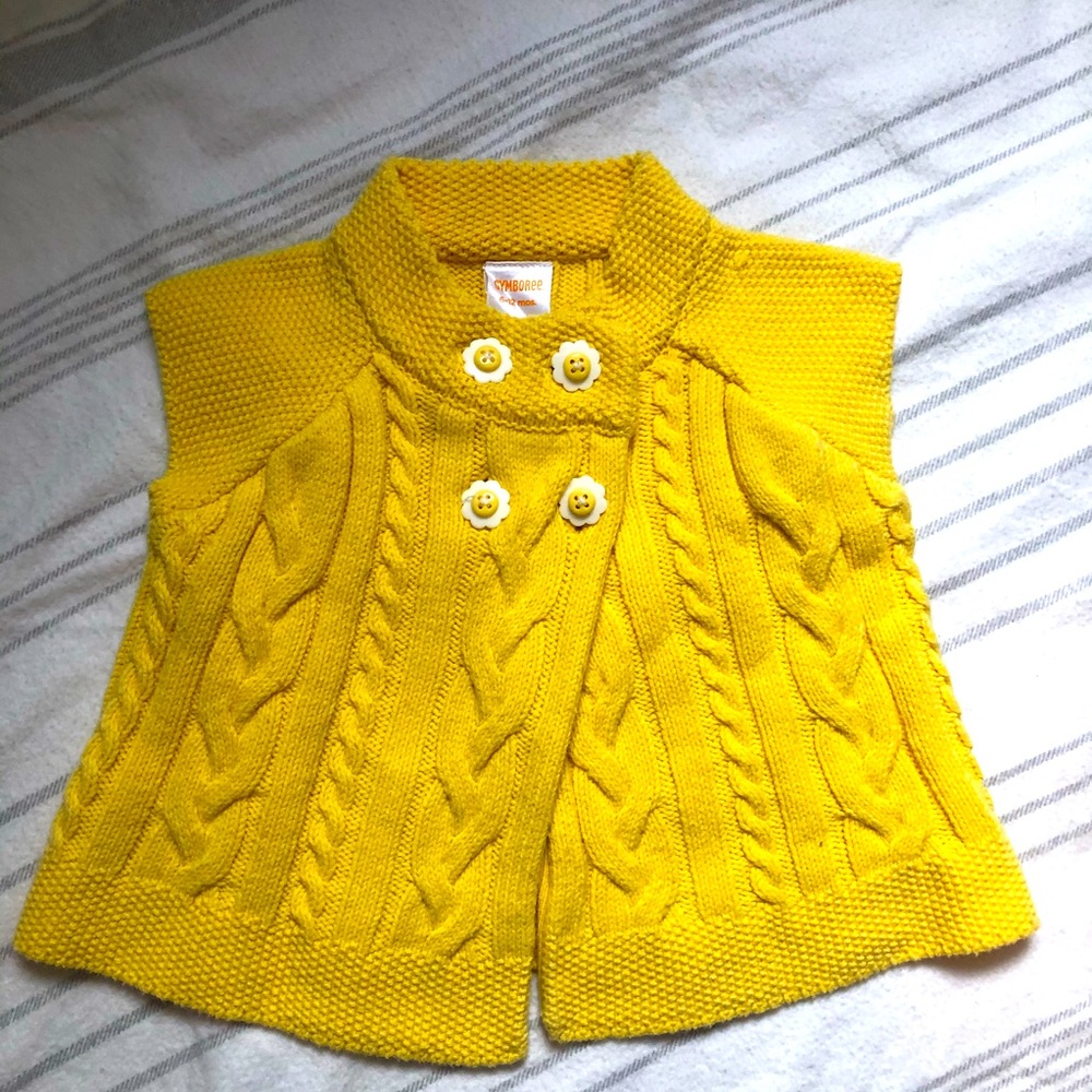 Adorable sleeveless cardigan